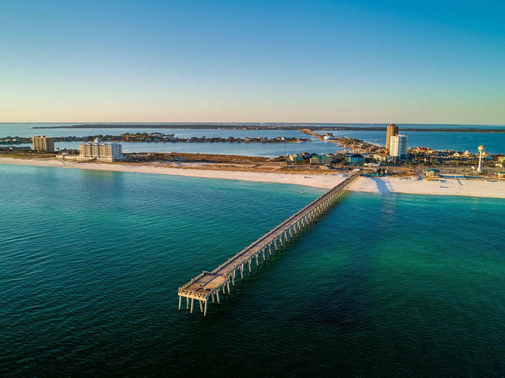 Aerial view of beach pier.