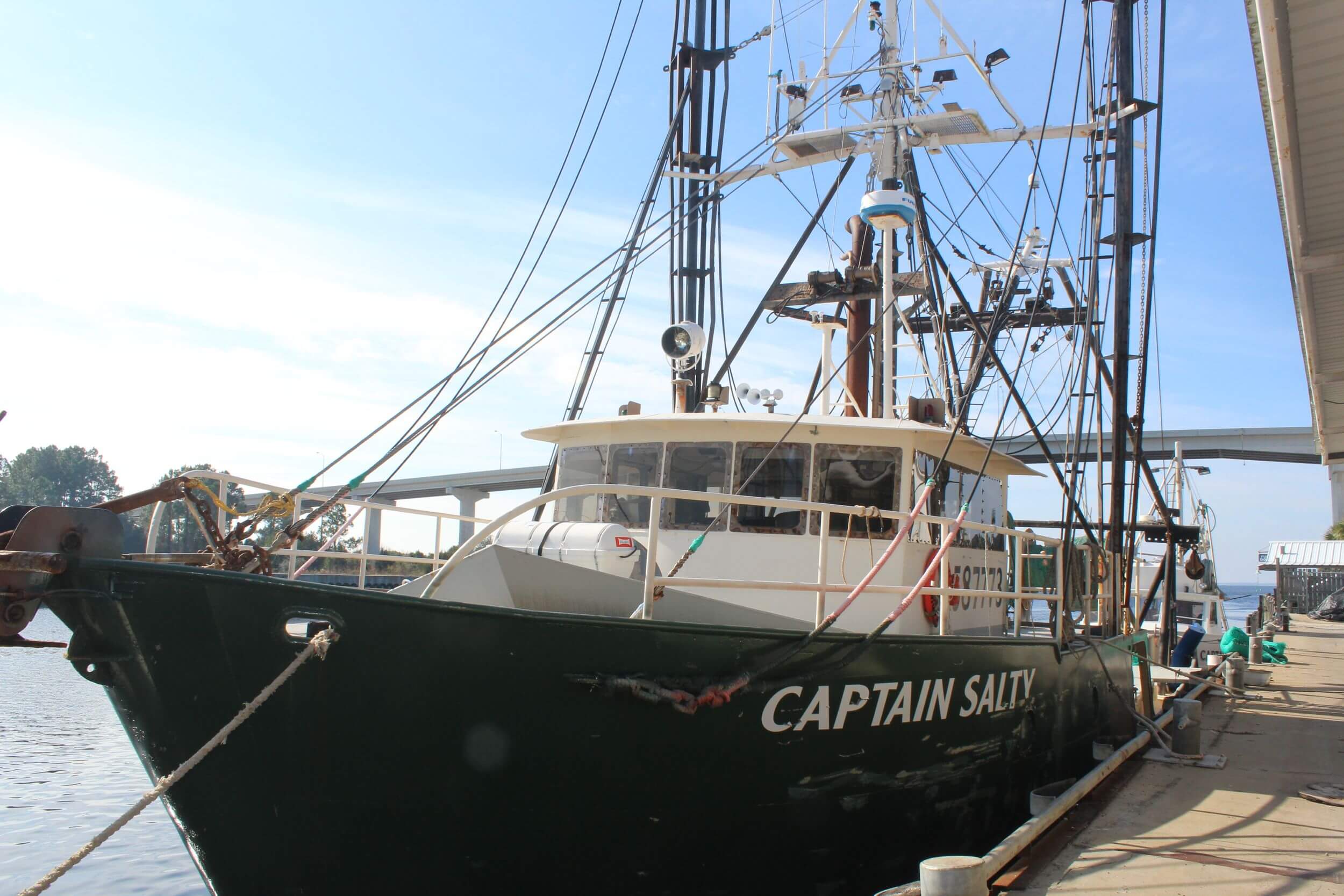 Docked fishing boat titled captain salty.