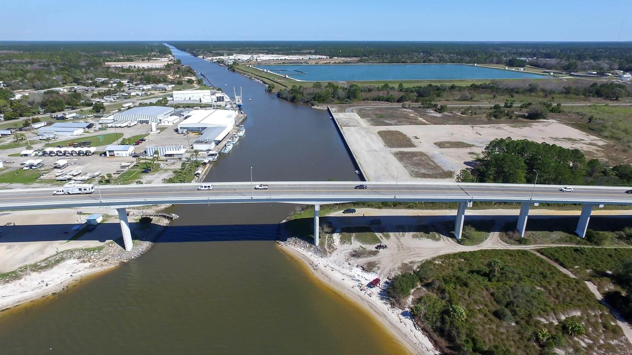 Aerial view of a highway over a river.