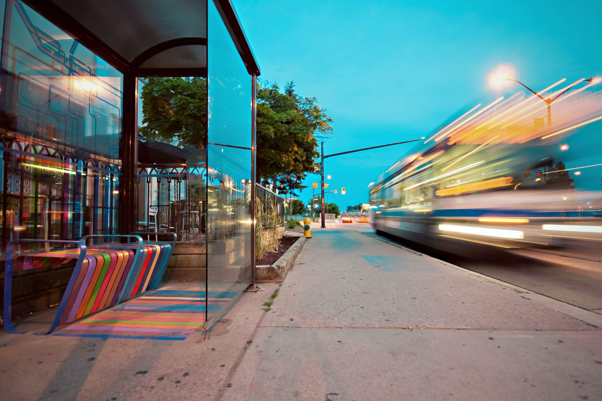 Timelapse photo of public bus stop.